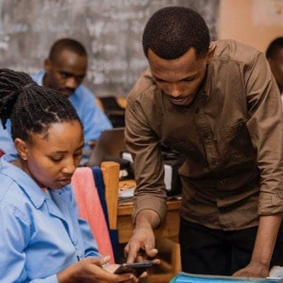 Helping students use the Berulo App at a school desk