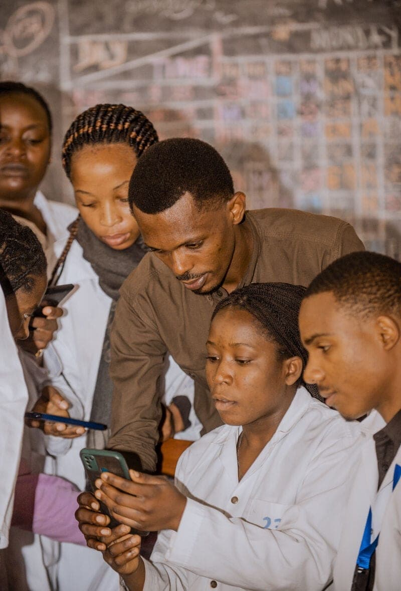 Students gathered around the Berulo App