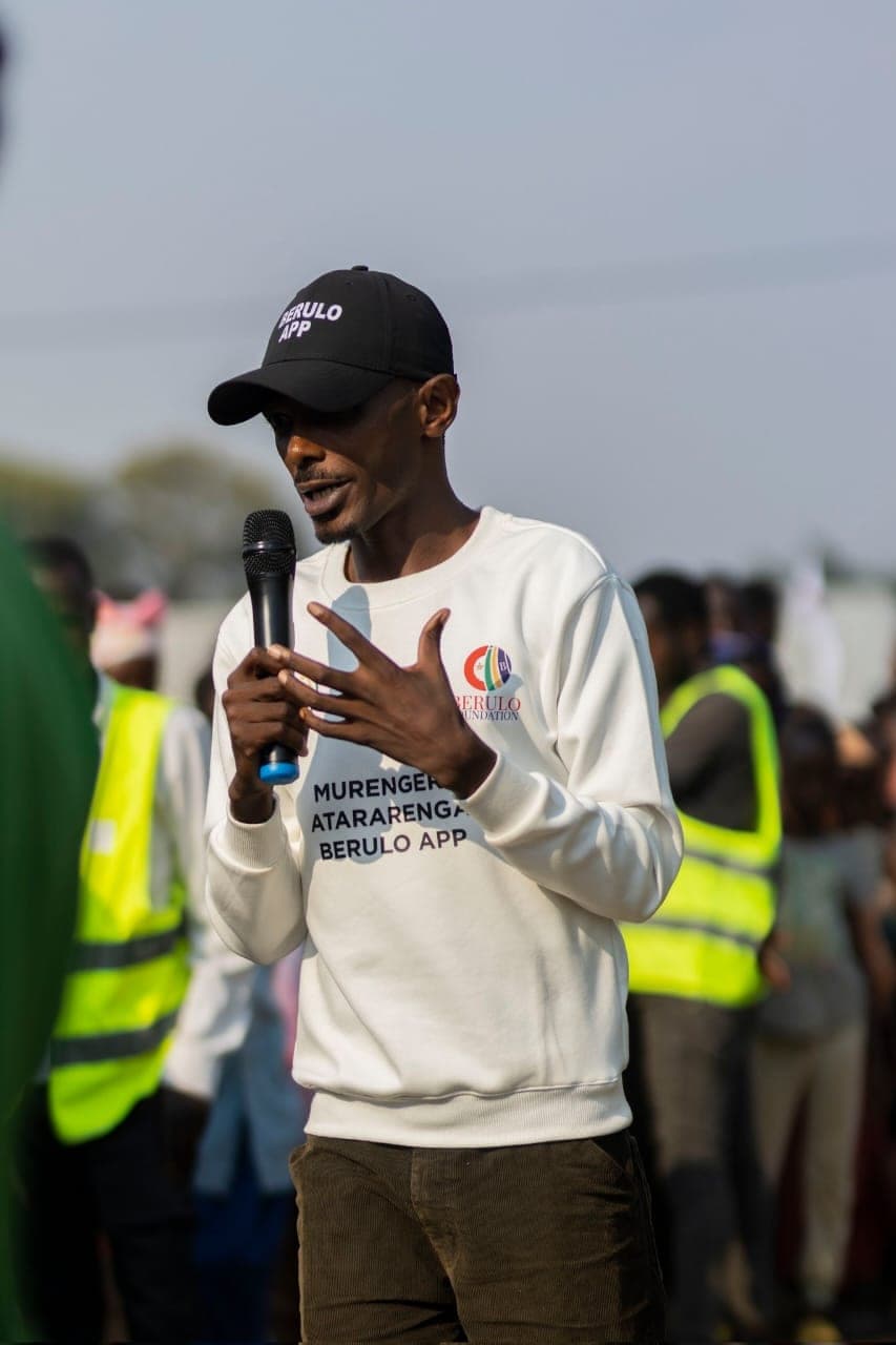 Addressing a gathering with a microphone